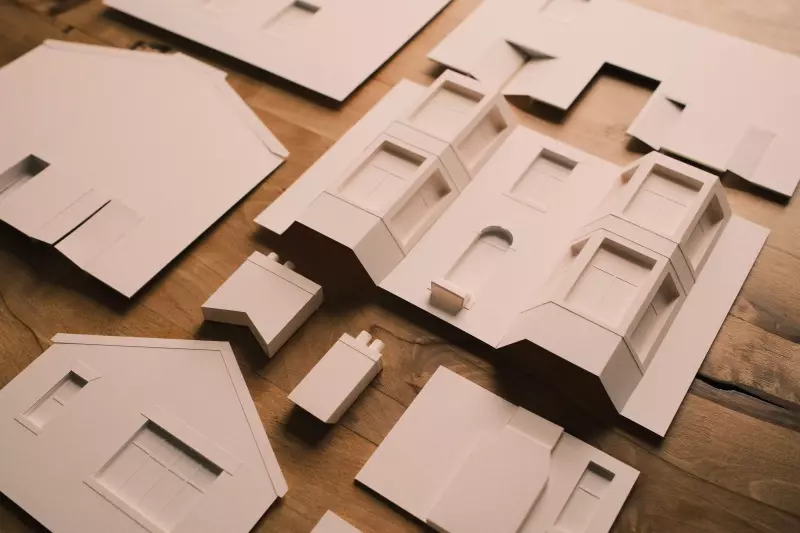 Components for a 1:50 paper model ready to be assembled for Joe & Co Architects