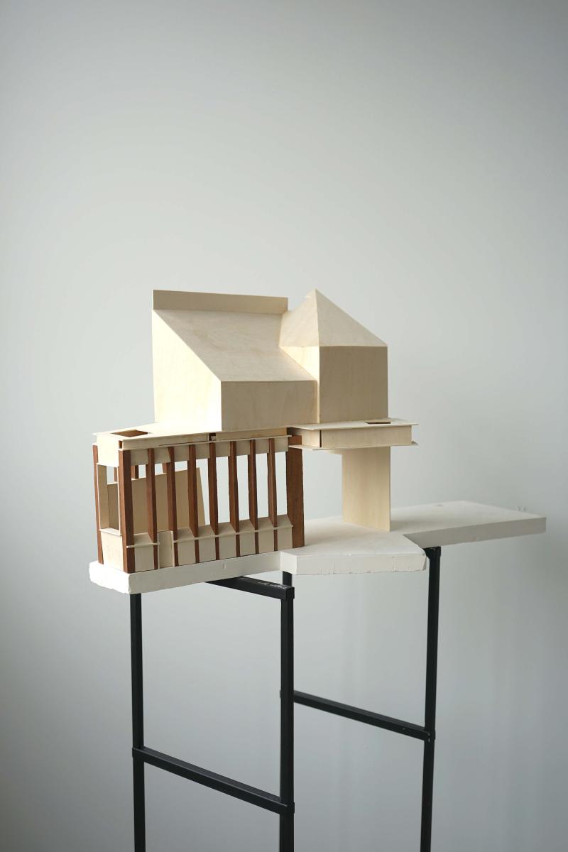 1:20 Building model of Woodbine Place. 

Birch plywood existing and Sapele and Maple wood proposed building model with a plaster base, sited on two steel plinths.