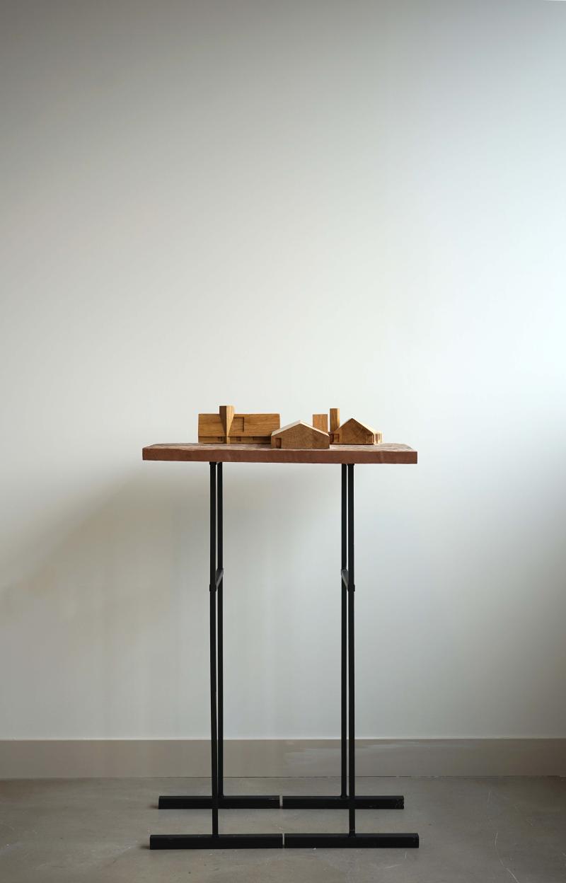 1:100 Site model of the house in The High Weald. 

European Oak proposed building model with a Bulletwood base, sited on two steel plinths.