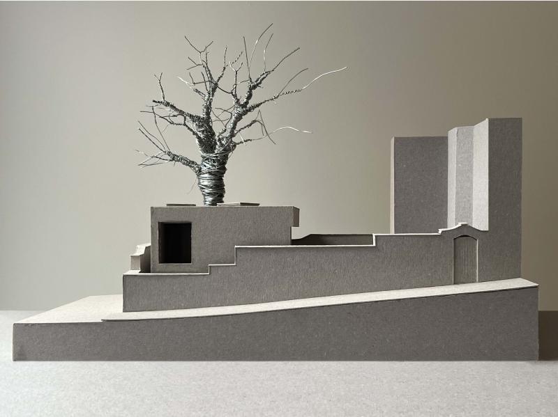 1:50 Outbuilding model of South Hill Park. 

Grey board existing and proposed building model with a plywood base.